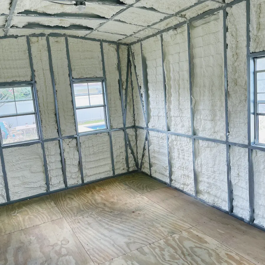 Closed-cell spray foam insulation applied to wall cavities in a residential project in Gardendale